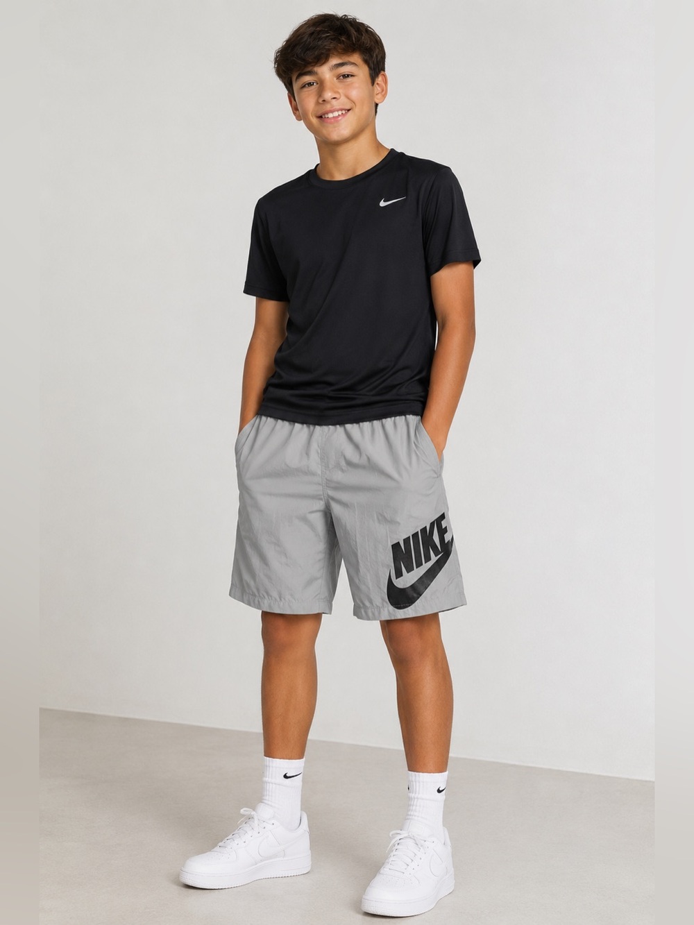 Nike Light Gray Boys’ Athletic Shorts with Black Logo